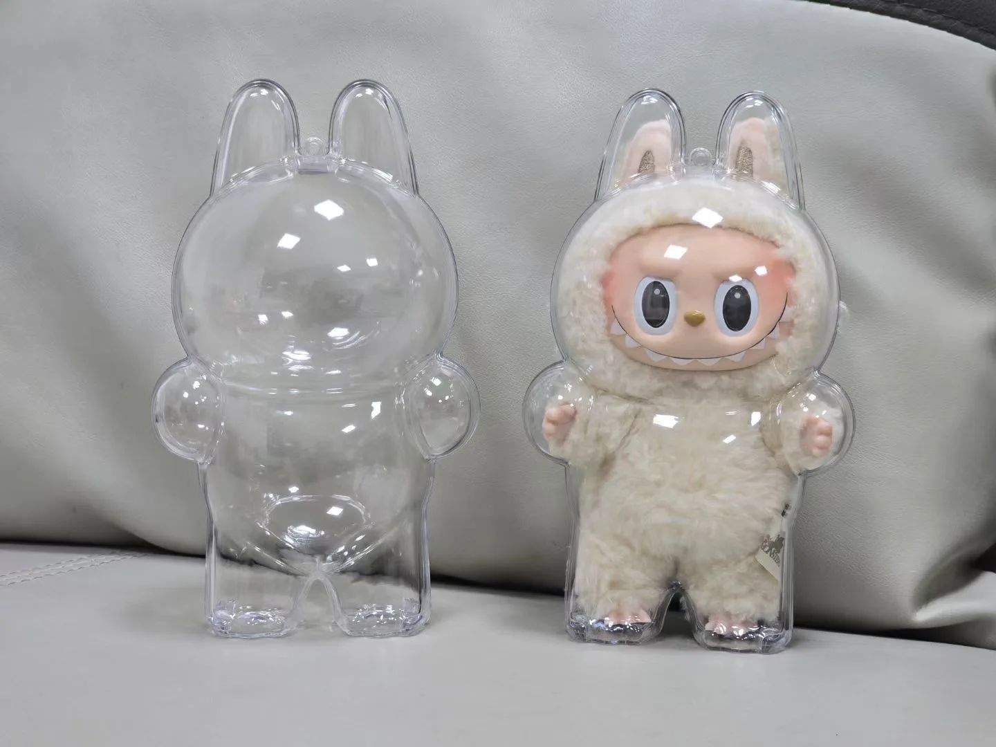 protective case for collector's figure - seated model, transparent