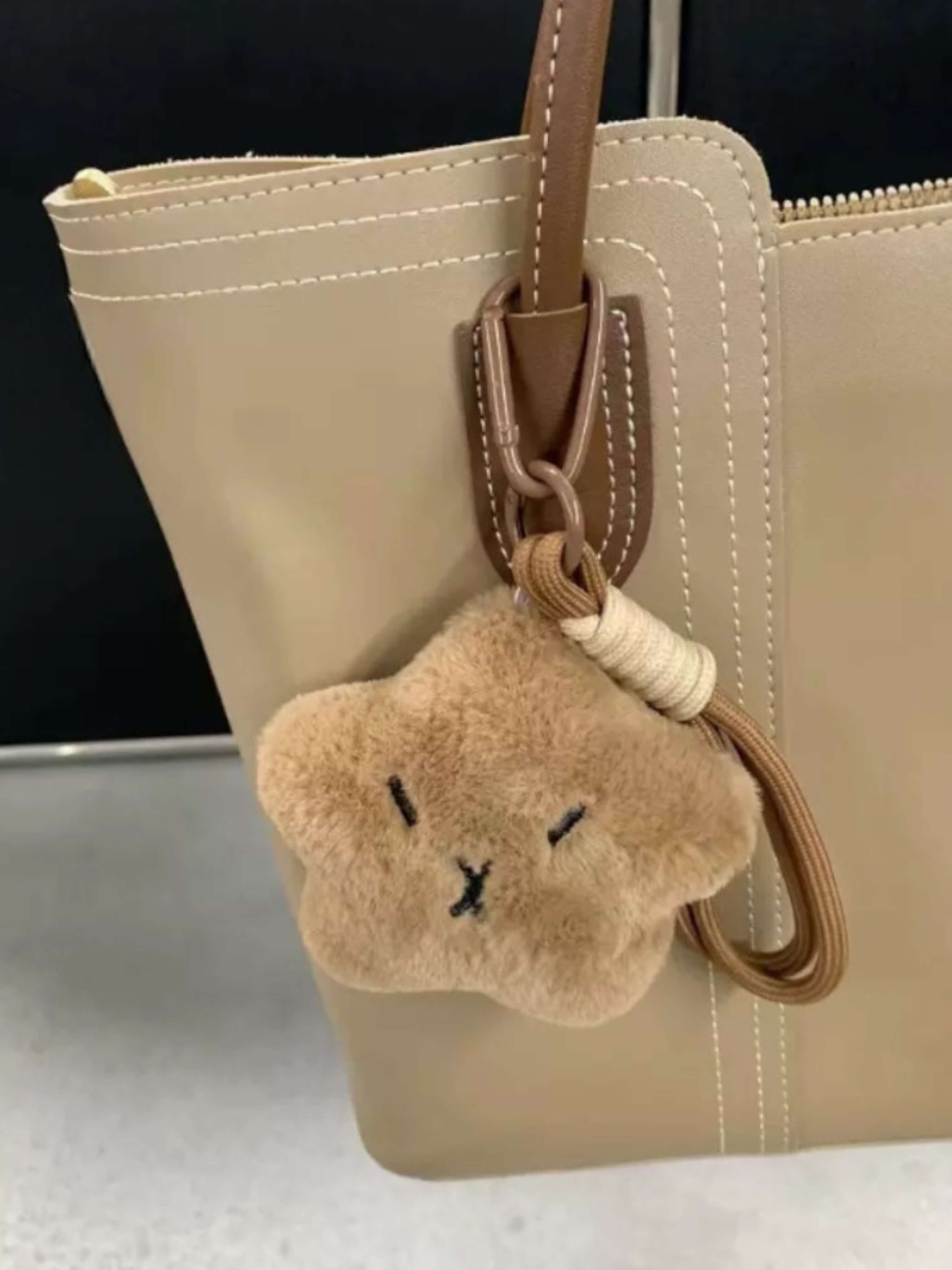 Filled star-shaped bag charm